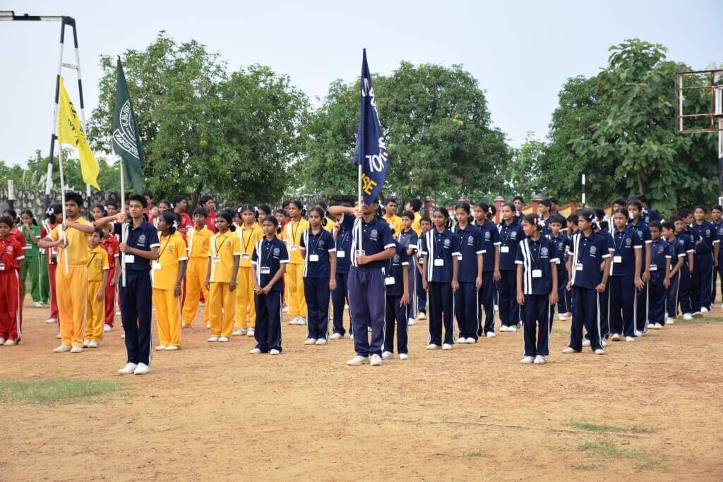 Sports day parade with house flags